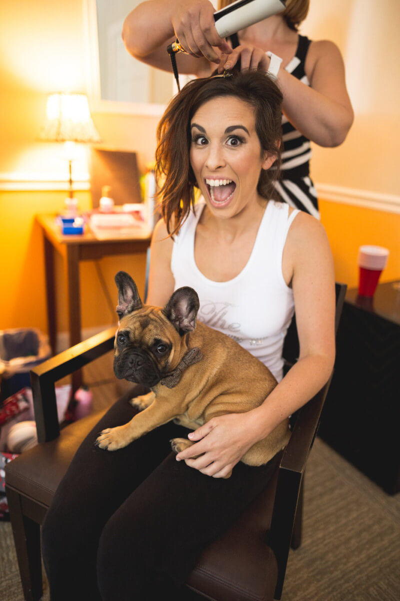 Bride with French Bulldog Puppy Getting Ready