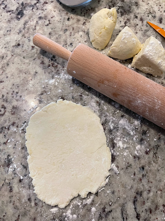 making the naan disc shapes